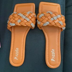 I’m selling these cute orange with bling accents summer flats. Never worn